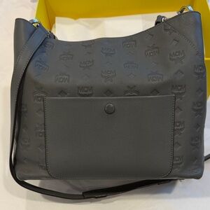MCM Shoulder or cross body zipper bag with dust bag